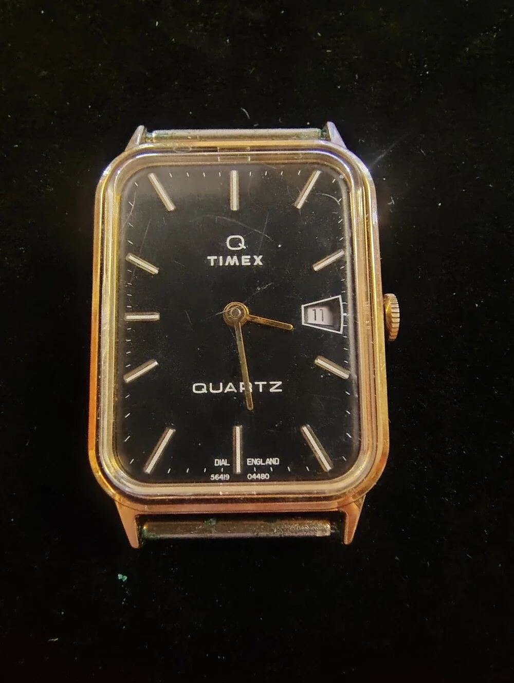 Timex Gold Tone Rectangular Watch with Black Dial
